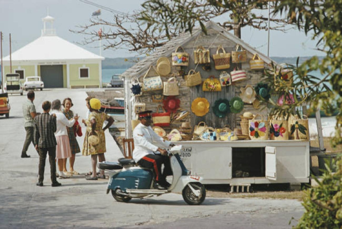 Harbour Island 
1970
by Slim Aarons

Slim Aarons Limited Estate Edition

Handbags and hat shop at Harbour Island in the Bahamas, 1970.

unframed
c type print
printed 2023
20 x 24"  - paper size

Limited to 150 prints only – regardless of paper