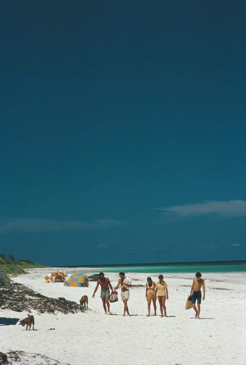 Harbour Isle Beach 
1973
by Slim Aarons

Slim Aarons Limited Estate Edition

Holidaymakers on the beach at Harbour Isle in the Bahamas, March 1973.

unframed
c type print
printed 2023
20 × 16 inches - paper size


Limited to 150 prints only –