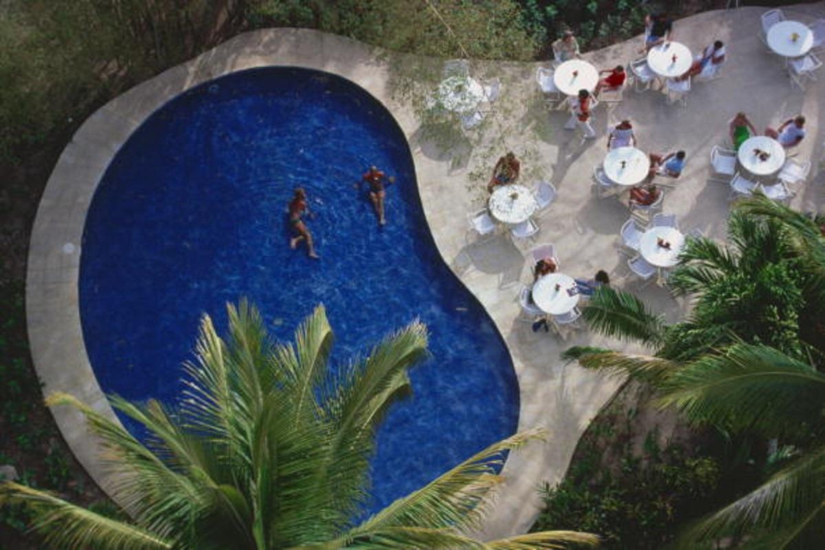 'Hotel Camino Real' 1979 Slim Aarons Limited Estate Edition Print 

The swimming pool of the Hotel Camino Real in the resort city of Puerto Vallarta, Jalisco, Mexico, April 1979. 
(Photo by Slim Aarons/Getty Images)

Produced from the original
