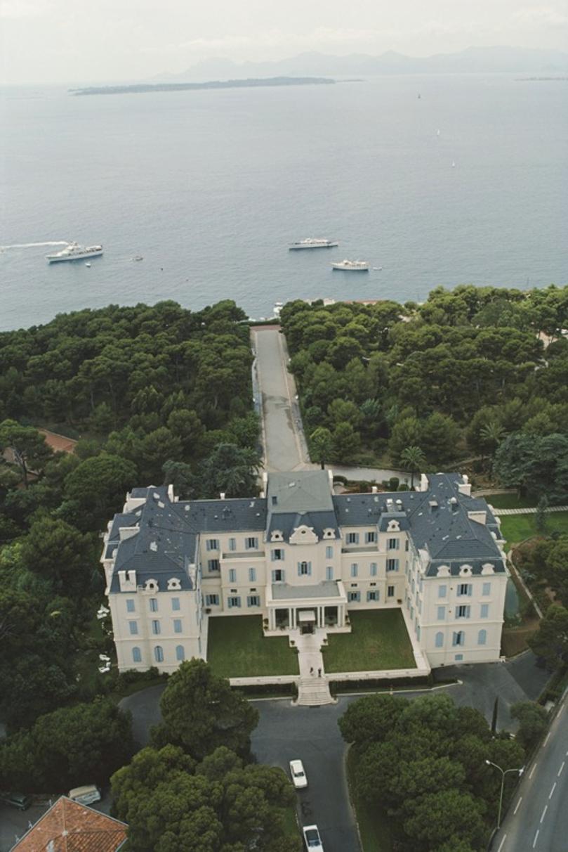 Hotel du Cap 
1976
by Slim Aarons

Slim Aarons Limited Estate Edition

An aerial view of the Hotel du Cap Eden-Roc, Antibes, France, August 1976. 

unframed
c type print
printed 2023
24 x 20"  - paper size

Limited to 150 prints only – regardless of