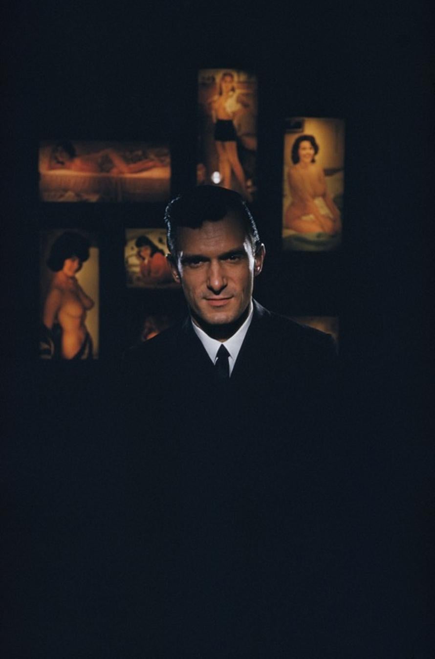 Hugh Hefner 
1961
by Slim Aarons

Slim Aarons Limited Estate Edition

American publisher Hugh Hefner, founder of ‘Playboy’ magazine, surrounded by erotica at the Playboy Club in Chicago, 1961.

unframed
c type print
printed 2023
24 x 20"  - paper