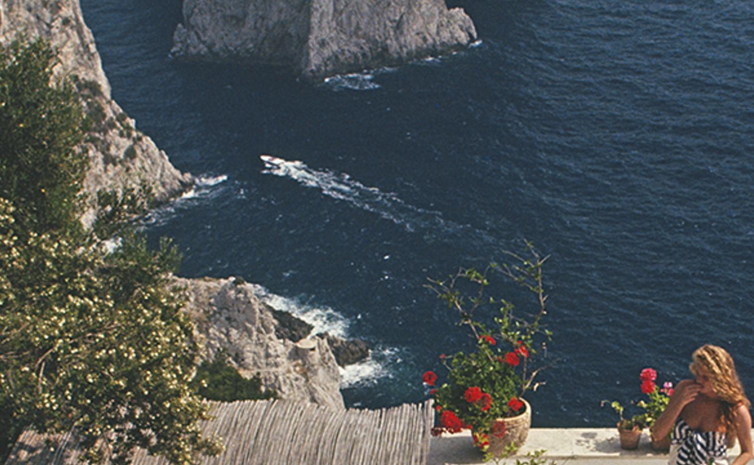 Il Canille, 1980 - Capri Landscape Photography Faraglioni Rocks Blue Horizon by Slim Aarons

16 x 20