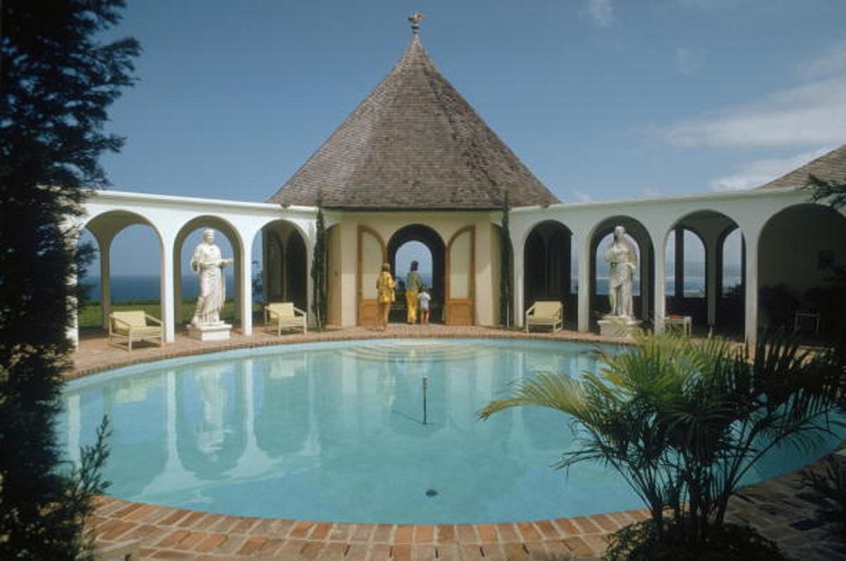 'Jamaican Jewel' 1970 Slim Aarons Limited Estate Edition Print 

The swimming pool at the Jamaican home of Philadelphia jeweller Douglas Cooper, March 1970. 

Produced from the original transparency
Certificate of authenticity supplied 
Archive