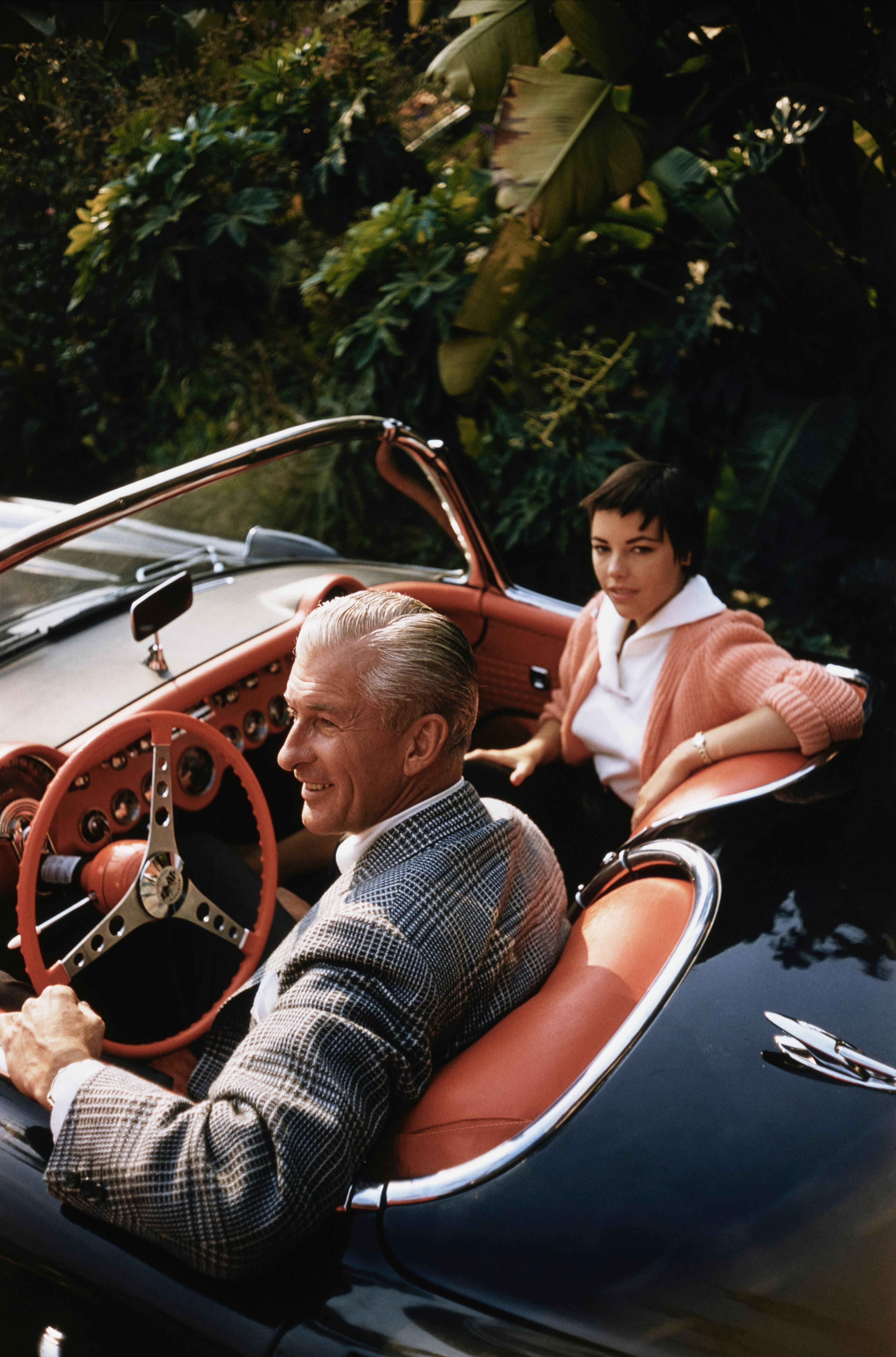 Slim Aarons Color Photograph - Jim Kimberly and Kim Wadsworth at the Beverly Hills Hotel