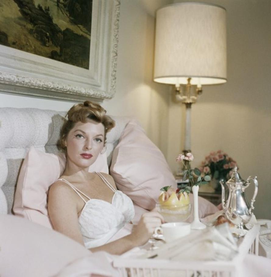Julie London 
1957
by Slim Aarons

Slim Aarons Limited Estate Edition

Singer Julie London enjoying breakfast in bed at the Beverly Hills Hotel, circa 1957

unframed
c type print
printed 2023
20 x 20"  - paper size


Limited to 150 prints only –