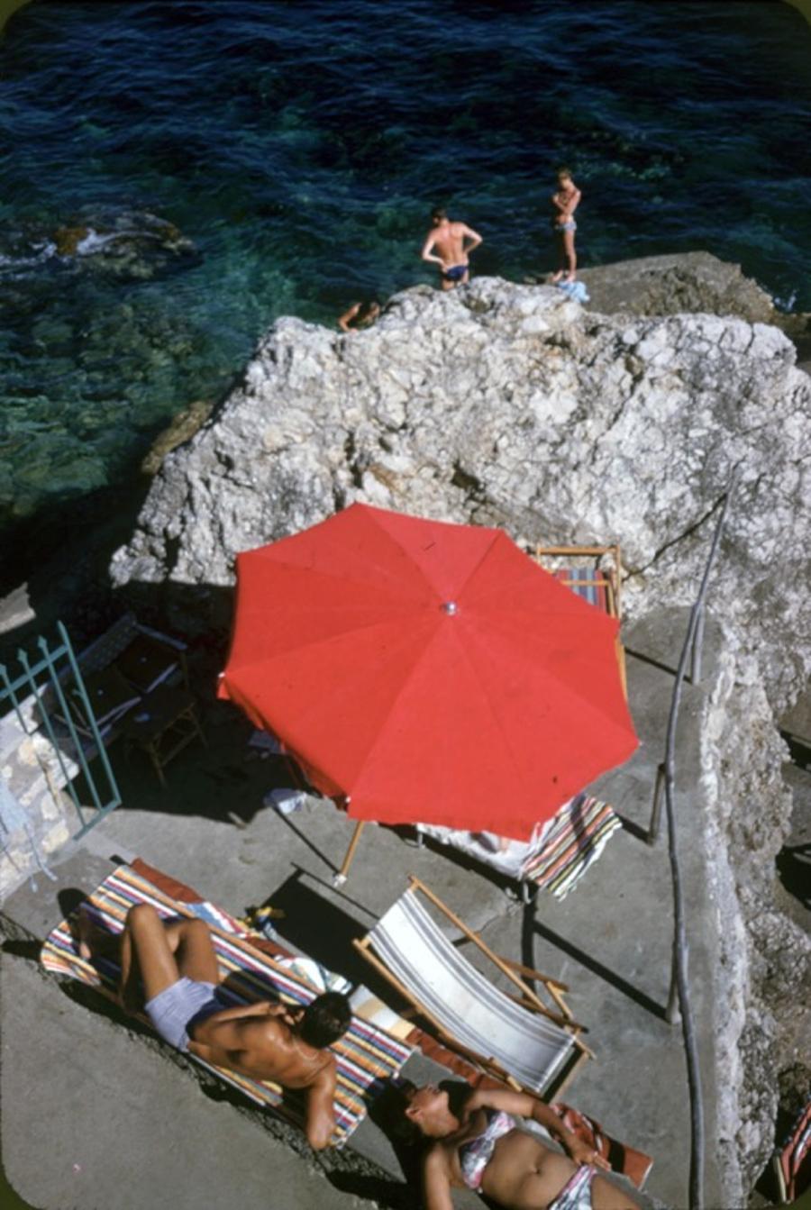 La Canzone del Mare 
1958
by Slim Aarons

Slim Aarons Limited Estate Edition

La Canzone del Mare in Capri, Italy, July 1958. 

unframed
c type print
printed 2023
24 x 20"  - paper size

Limited to 150 prints only – regardless of paper size

blind