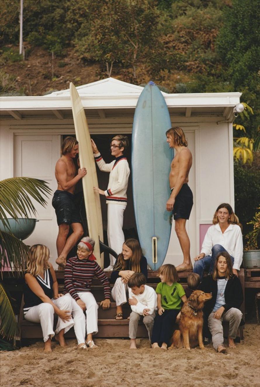Laguna Beach 
1970
by Slim Aarons

Slim Aarons Limited Estate Edition

Surfers outside a beach hut in Laguna Beach, California, January 1970. 

unframed
c type print
printed 2023
20 × 16 inches - paper size


Limited to 150 prints only – regardless