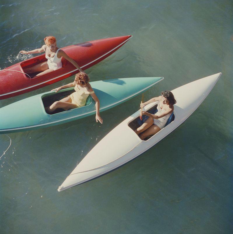 Slim Aarons Color Photograph - Lake Tahoe Canoes (1959) Limited Estate Stamped