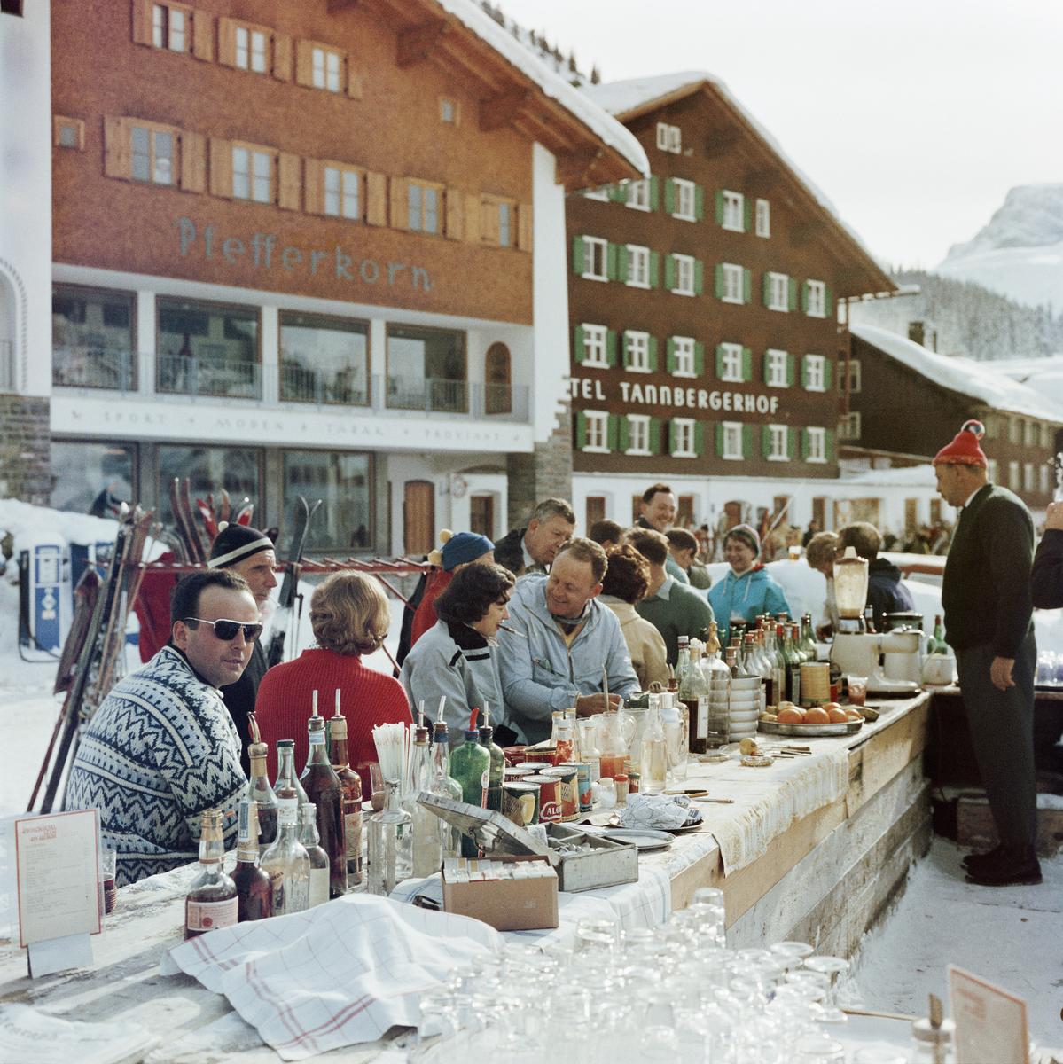 Lech Ice Bar 

1960

The Ice Bar at the Hotel Krone in Lech, Austria, 1960. The Hotel Pfefferkorn and Hotel Tannbergerhof are in the background. 

By Slim Aarons

30x30” / 76x76 cm - paper size 
C-Type Print
unframed 

Estate Stamped Edition