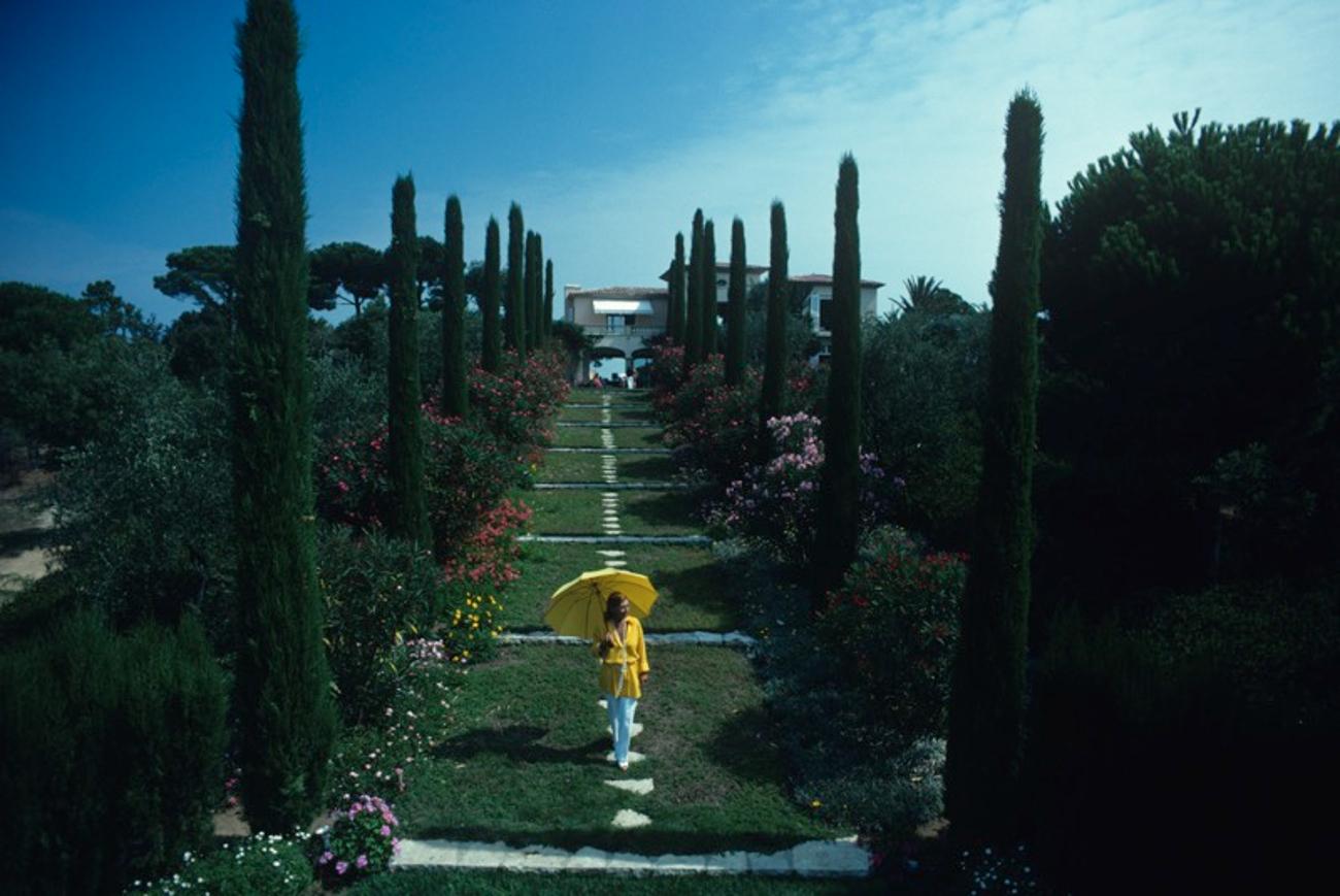 Les Sophores 
1977
by Slim Aarons

Slim Aarons Limited Estate Edition

Janine Bril in the garden of Les Sophores, her villa in Saint-Tropez, on the French Riviera, August 1977.

unframed
c type print
printed 2023
20 x 24"  - paper size

Limited to