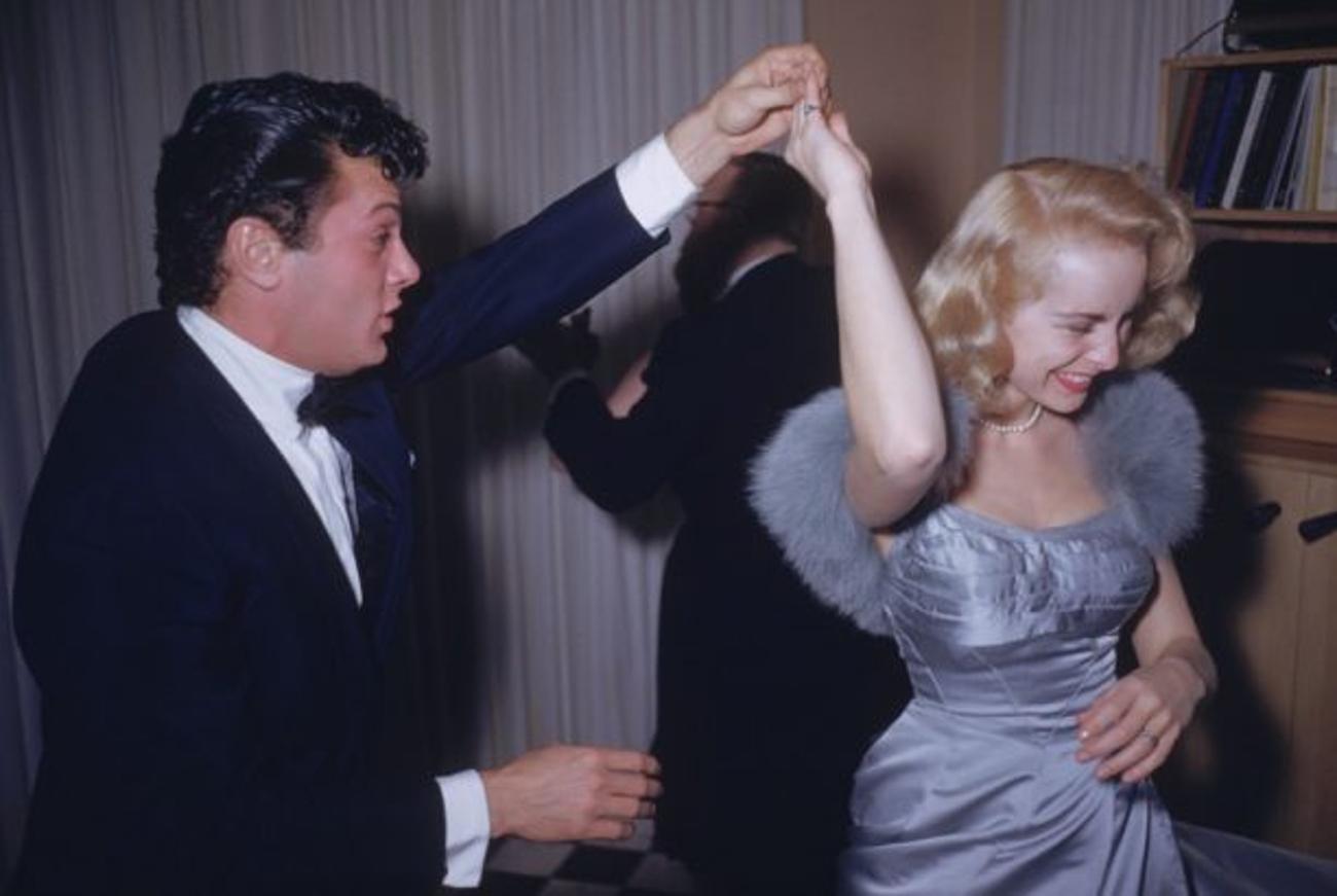 Let’s Twirl 
1954
by Slim Aarons

Slim Aarons Limited Estate Edition

Film stars Tony Curtis (Bernard Schwarz) and his wife Janet Leigh (Jeanette Morrison) enjoying a dance at a Beverly Hills party held at James Mason’s home

unframed
c type