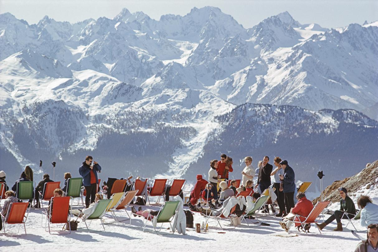 Lounging In Verbier 
1964
by Slim Aarons

Slim Aarons Limited Estate Edition

Holidaymakers in sun loungers on the slopes at Verbier, Switzerland, February 1964.

unframed
c type print
printed 2023
20 x 24"  - paper size

Limited to 150 prints only