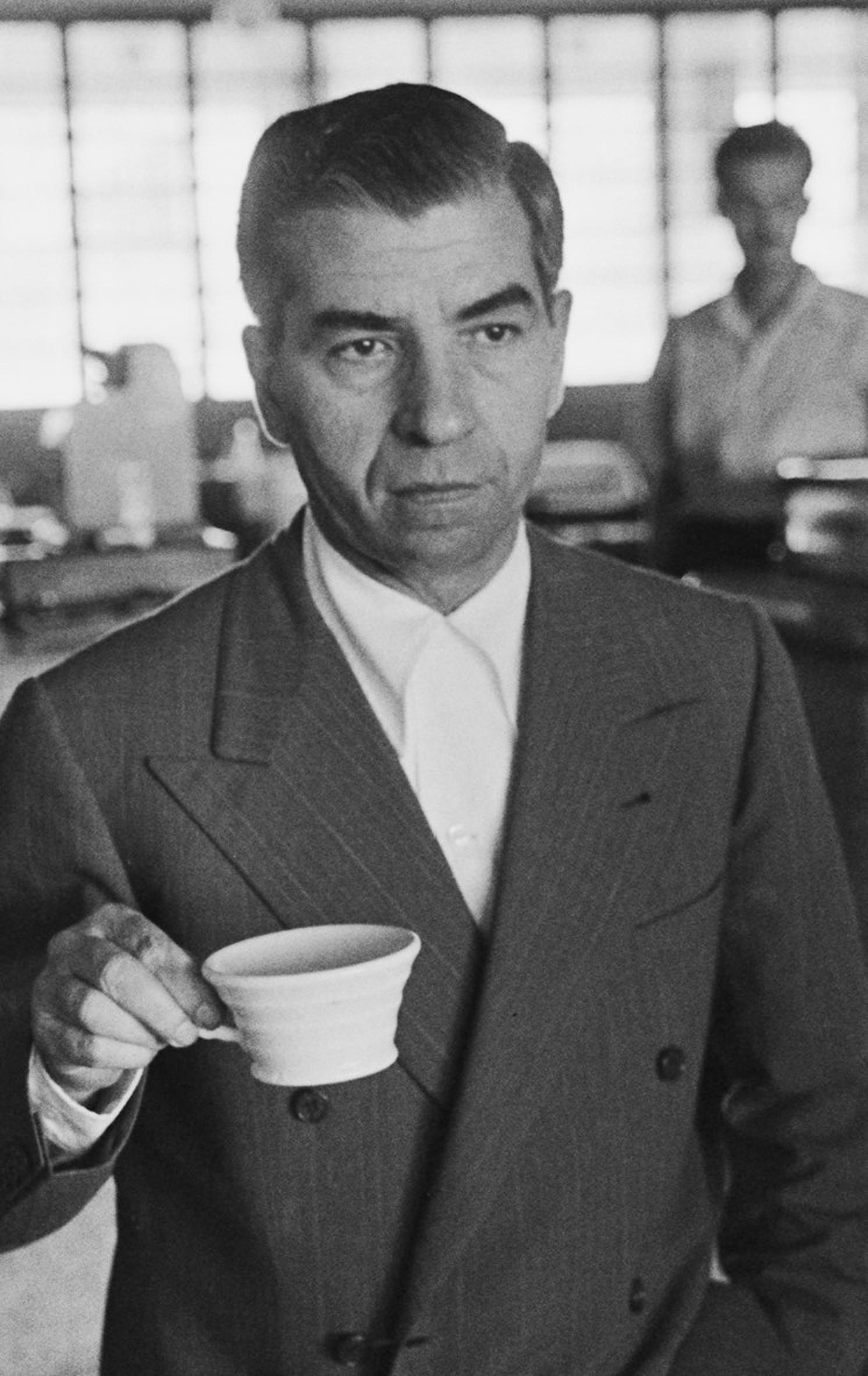 Lucky Luciano, 1950s - American Italian Mafia Mafioso Black and White Portrait by Slim Aarons

16 x 20
