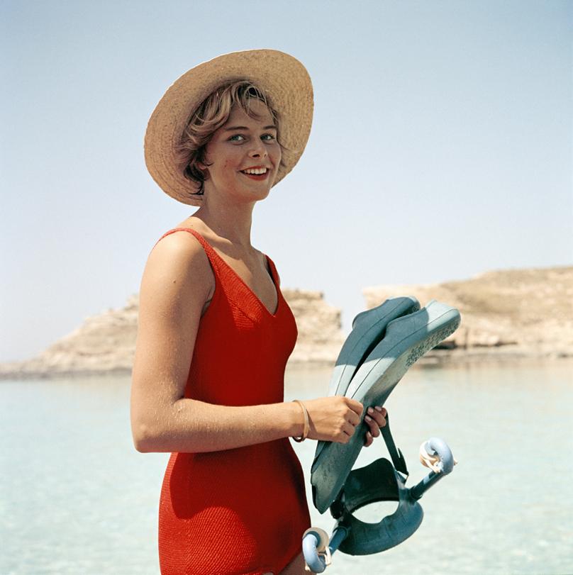 Marietine Birnie 
1959
by Slim Aarons

Slim Aarons Limited Estate Edition

Marietine Birnie snorkeling at the Blue Lagoon, Kemmuna (Comina), Malta, July 1959.

unframed
c type print
printed 2023
20 x 20"  - paper size


Limited to 150 prints only –