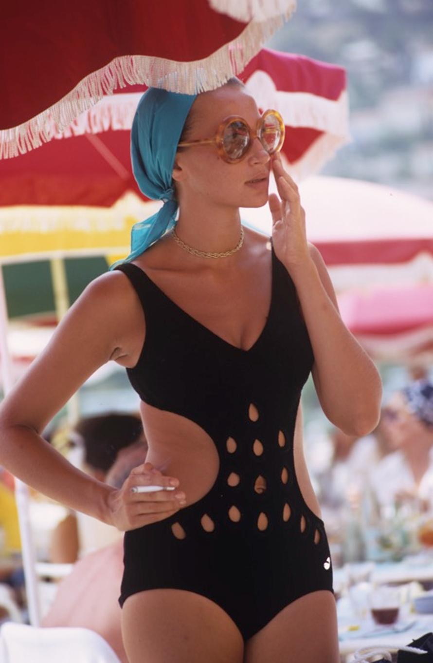 Monte Carlo Swimwear 
1970
by Slim Aarons

Slim Aarons Limited Estate Edition

 A woman in a cutaway swimsuit in Monte Carlo, August 1970. 

unframed
c type print
printed 2023
24 x 20"  - paper size

Limited to 150 prints only – regardless of paper