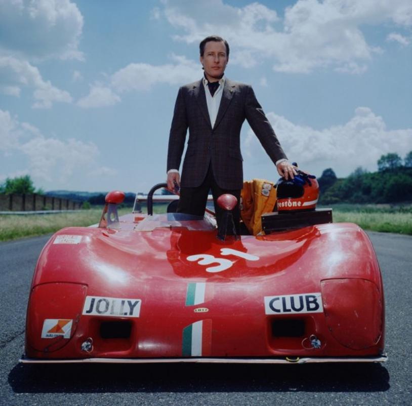 My Toy 
1982
by Slim Aarons

Slim Aarons Limited Estate Edition

April 1982: Member of the ‘Jolly Club’, Gabriele D’Annunzio, Prince Di Montenevoso at Vallelonga with his red Lola racing car. He is Chief Test Driver for Firestone