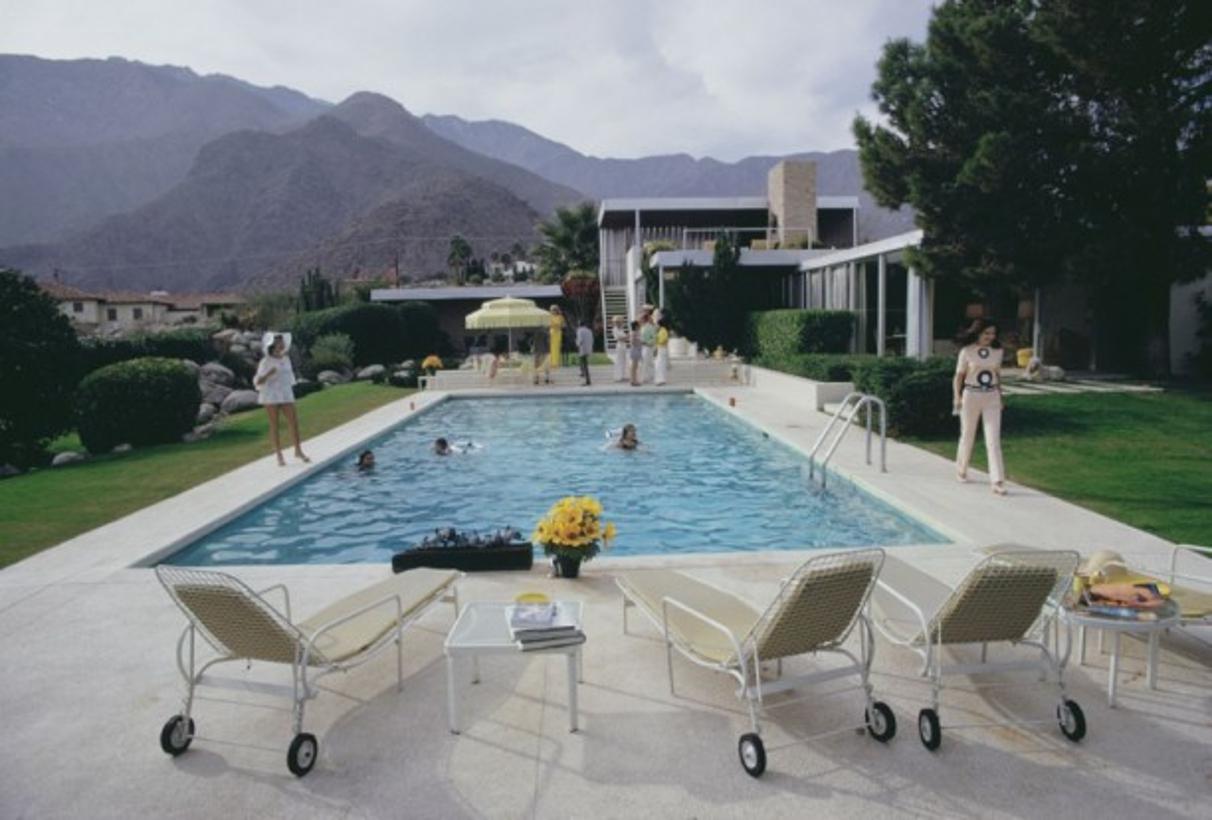 Neldas Pool 
1970
by Slim Aarons

Slim Aarons Limited Estate Edition

January 1970: The Kaufmann Desert House in Palm Springs, California, designed by Richard Neutra in 1946 for businessman Edgar J. Kaufmann, and now owned by Nelda