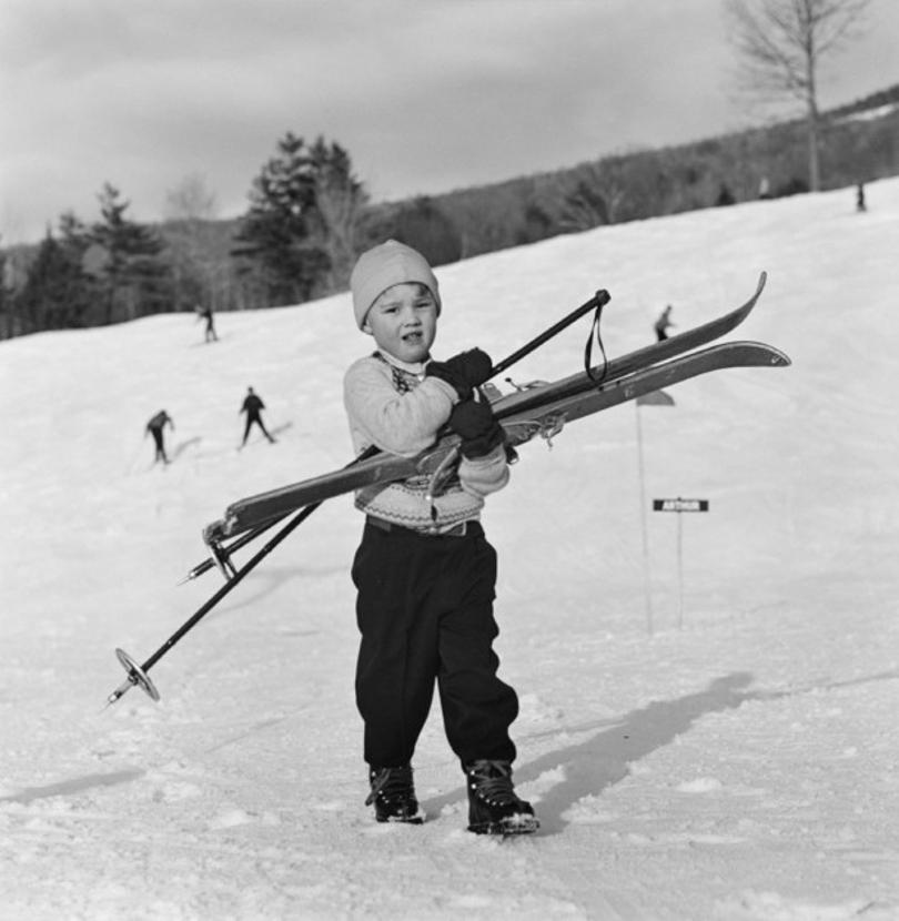 New England Skiing Starters 
1955
by Slim Aarons

Slim Aarons Limited Estate Edition

A young skier prefers to carry his skis down the slope in New Hampshire, 1955

unframed
Silver gelatin print
printed 2023
16 × 16″ - paper size


Limited to 150