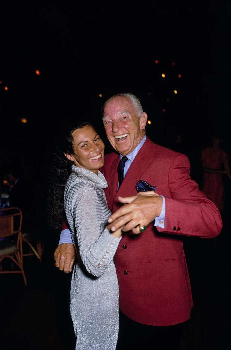 American financier and art collector J. Patrick Lannan and Marcia Pressman enjoy a dance together at a party hosted by Jim Kimberly at the Everglades Club in Palm Beach, Florida, April 1968.

Slim Aarons
Patrick Lannan And Marcia