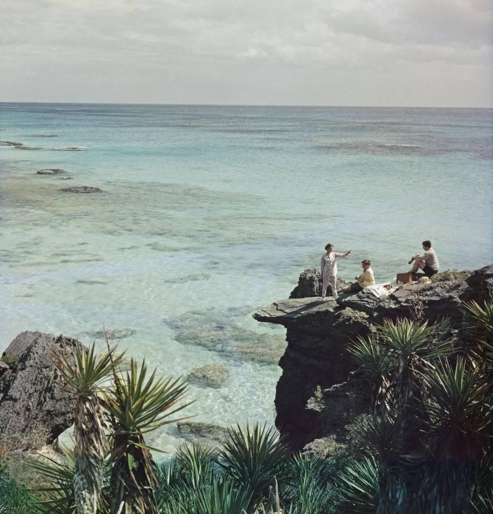 'A Nice Spot For Lunch'  by Slim Aarons

A group enjoy a picnic at a rocky coastline in Bermuda, 1957. (Photo by Slim Aarons)

A brand new archive discovery , this gorgeous photograph epitomises the vintage style and glamour of the period's wealthy