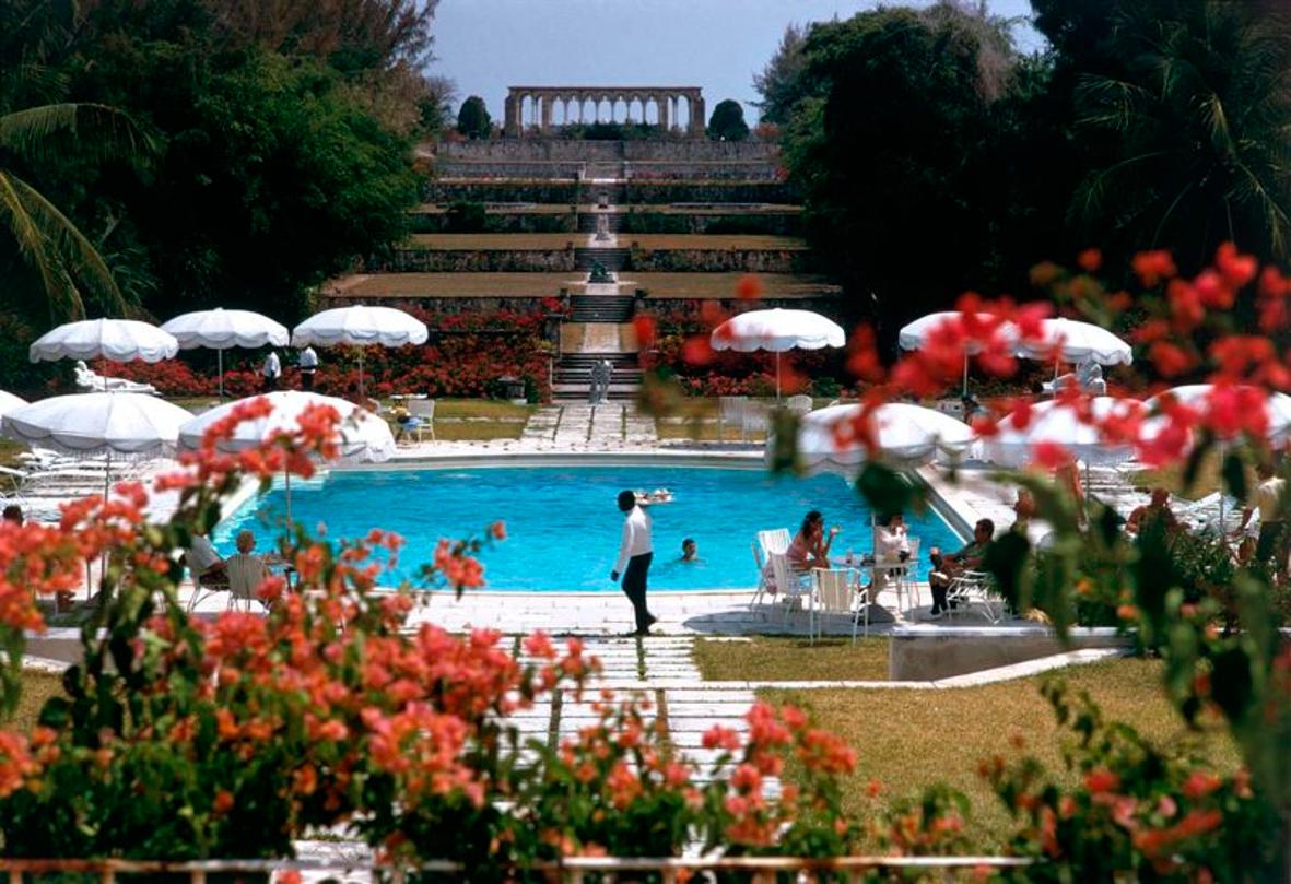 Ocean Club 
1968
by Slim Aarons

Slim Aarons Limited Estate Edition

Versailles Gardens at the Ocean Club, Nassau with terraced steps leading from a swimming pool to a 14th century French cloisters.

unframed
c type print
printed 2023
16×20 inches -