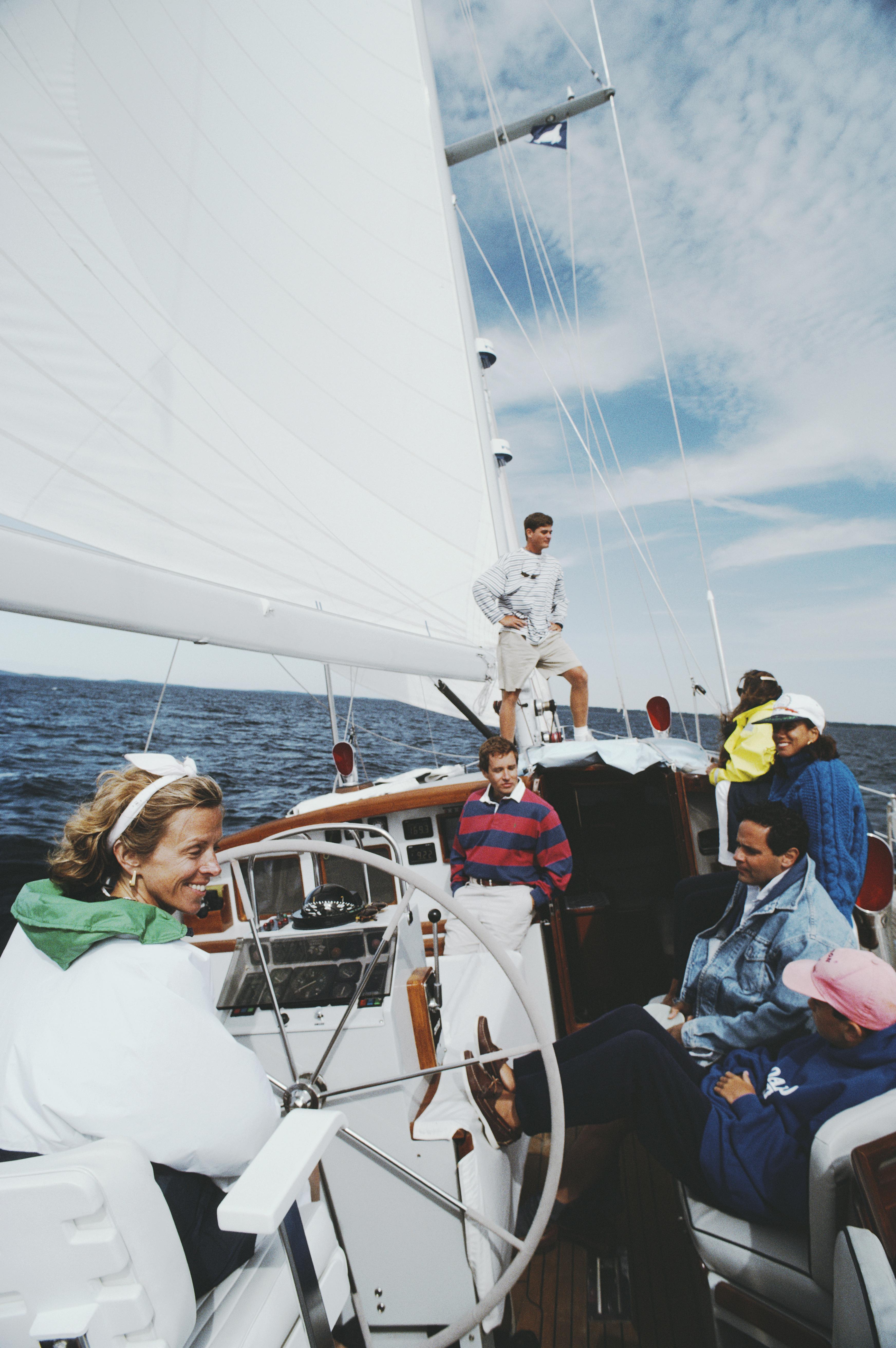 'On Board The Palawan' 1992 Slim Aarons Limited Estate Edition Print 

Olive Watson (left) takes her friends out sailing off the coast of Maine on her yacht, Palawan, 1992. On board are her nephew, Italian antiques dealer Anthony Ingrao, Viennese