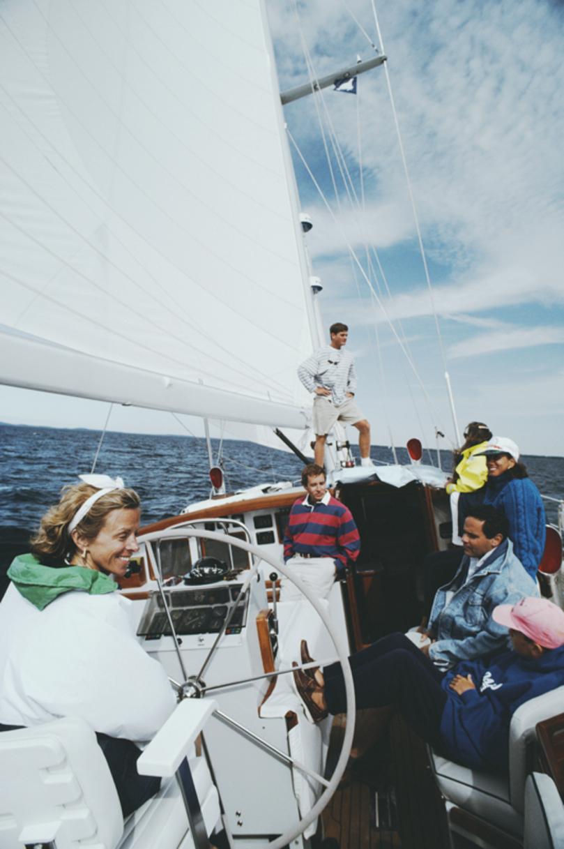 On Board The Palawan 
1992
by Slim Aarons

Slim Aarons Limited Estate Edition

Olive Watson (left) takes her friends out sailing off the coast of Maine on her yacht, Palawan, 1992. On board are her nephew, Italian antiques dealer Anthony Ingrao,
