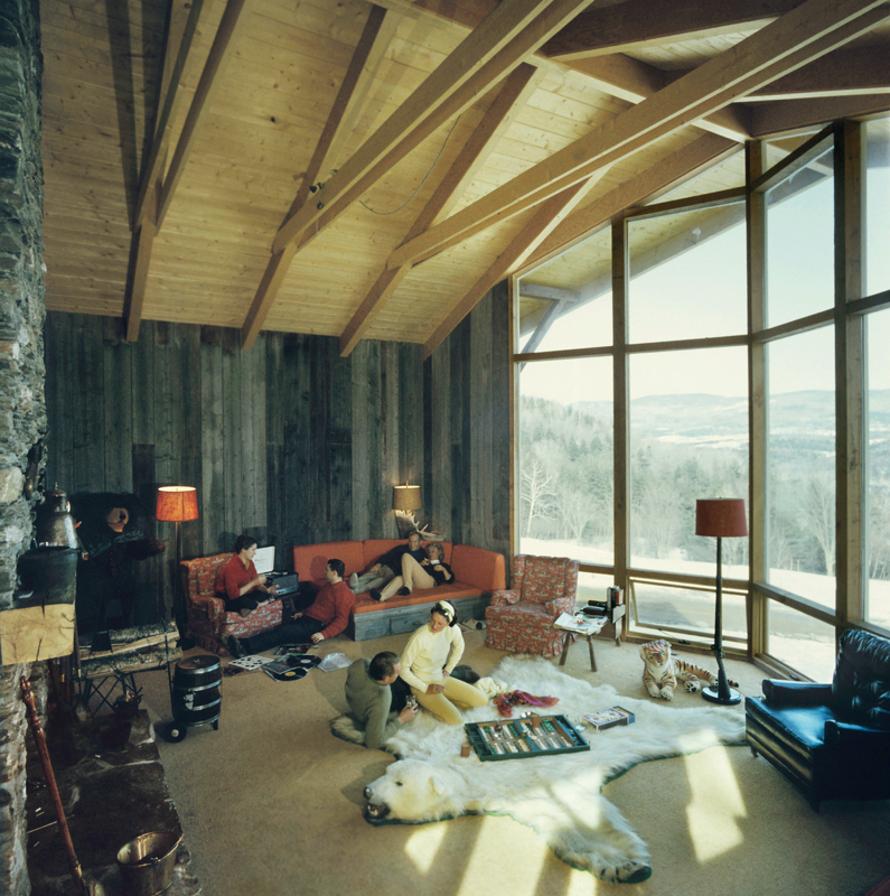On The Sugarbush Slopes 
1960
by Slim Aarons

Slim Aarons Limited Estate Edition

Stockbroker A Albert Sack Jr playing backgammon with Betsy Pickering on a polar bear rug at his chalet at the Sugarbush Mountain ski resort in Warren, Vermont,