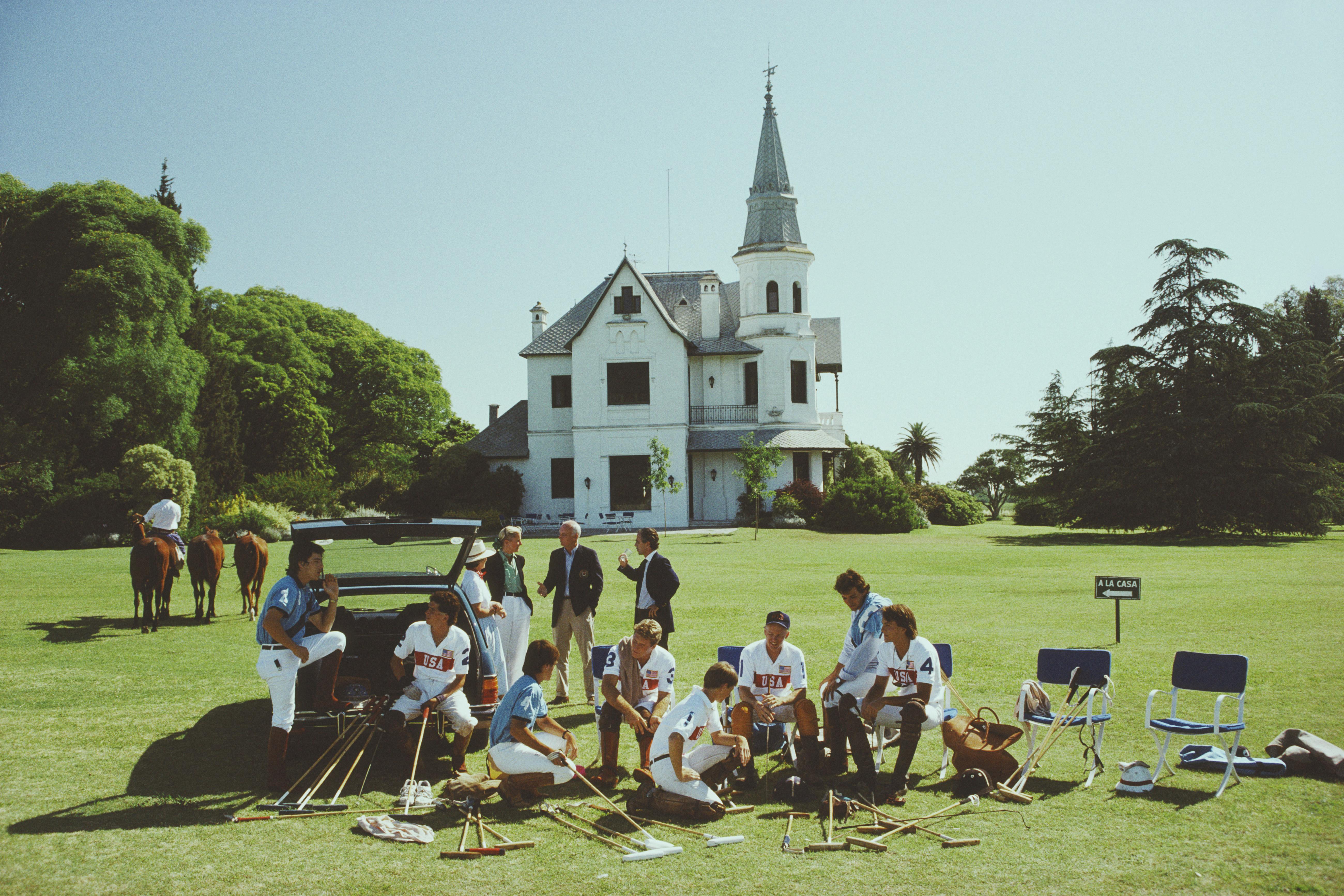 'Polo Gear' 

A group of polo players with their equipment, Argentina, December 1990. 

Paper Size  24x20 inches / 60 x 50 cm 
 
Estate Stamped Collection Edition to 150 

Photo by Slim Aarons

Printed in 2025

Limited to 150 prints only (regardless