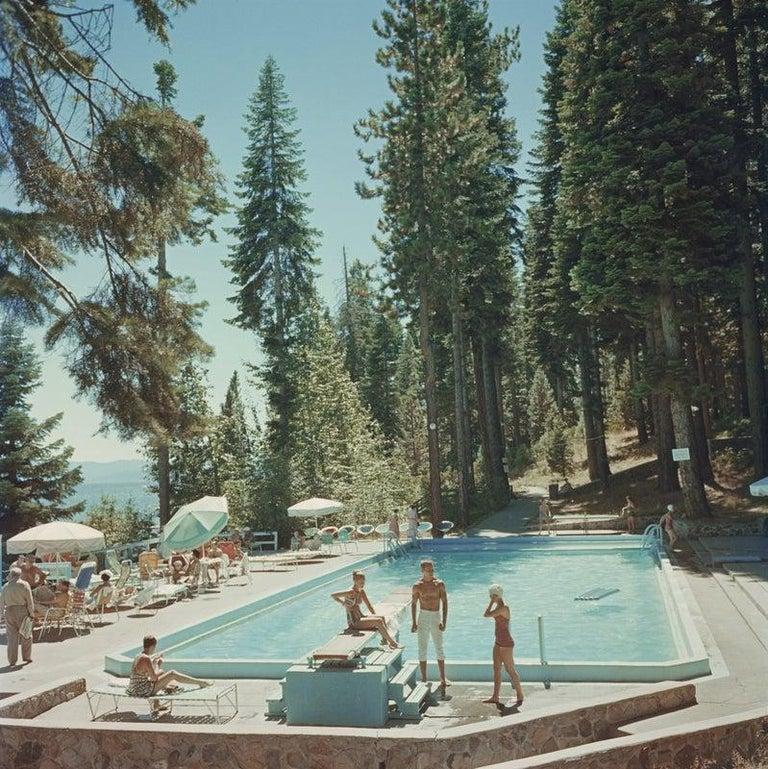 Bathers by a pool at the Tahoe Tavern on the shore of Lake Tahoe, California, 1959. (Photo by Slim Aarons/Hulton Archive/Getty Images)

This photograph is from the Estate Limited Edition of 150
30x30”
C-print, from the original transparency
Printed