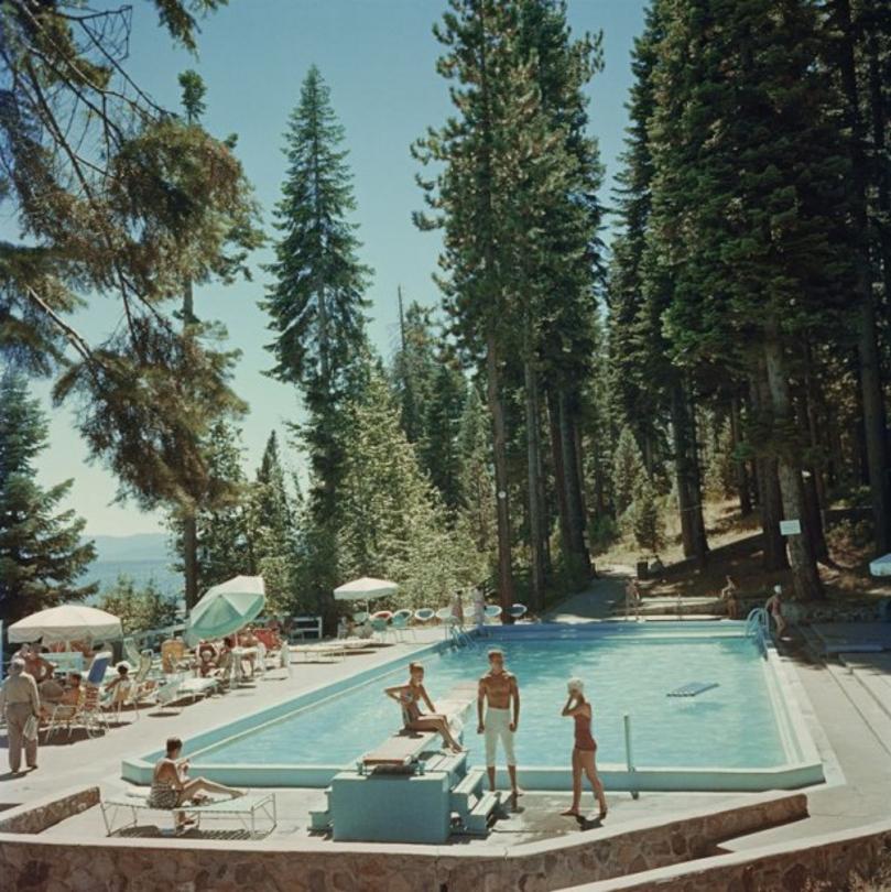 Pool At Lake Tahoe 
1959
by Slim Aarons

Slim Aarons Limited Estate Edition

Bathers by a pool on the shore of Lake Tahoe, California, 1959.

unframed
c type print
printed 2023
20 x 20"  - paper size


Limited to 150 prints only – regardless of