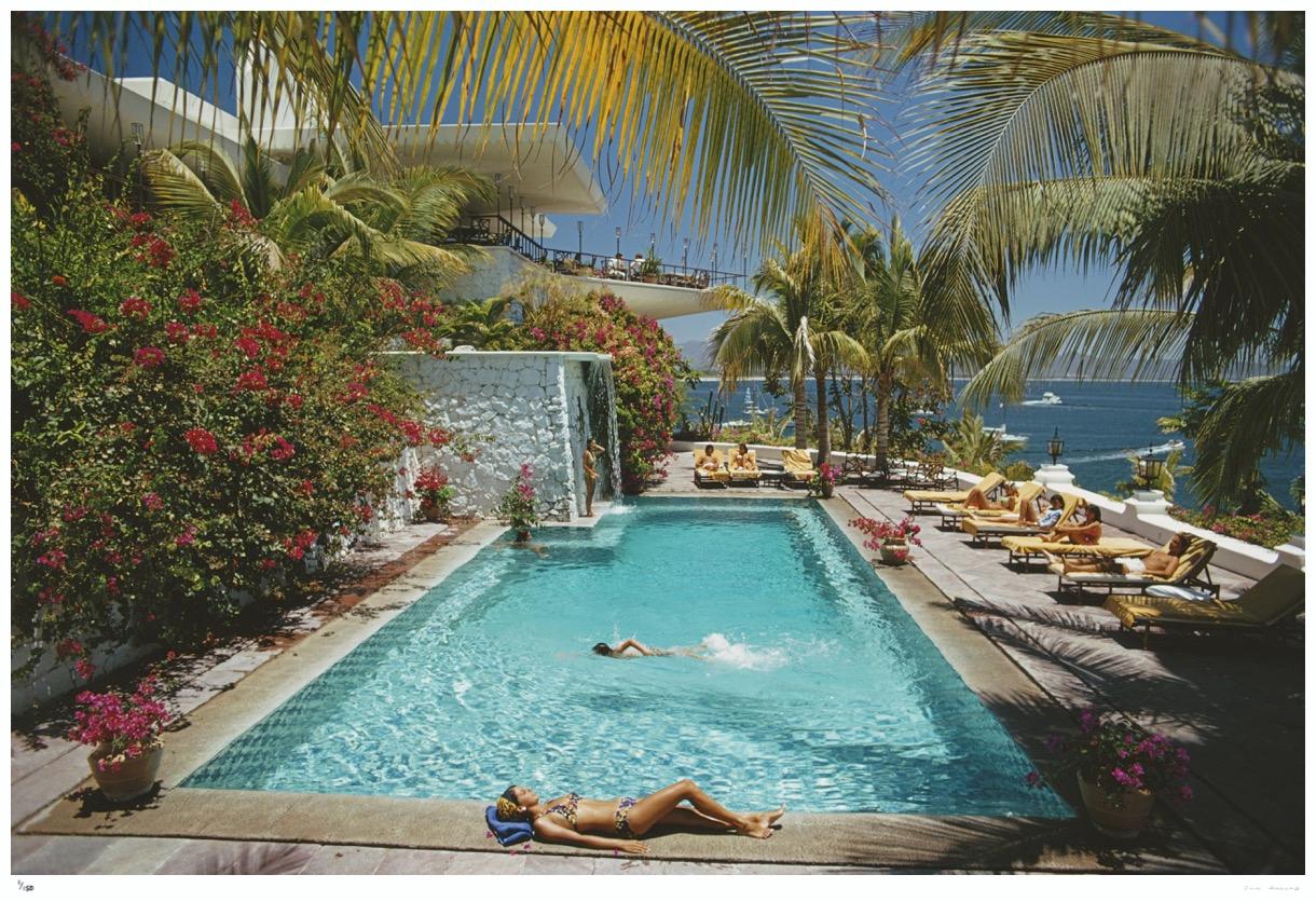 Pool At Las Hadas

1974

Guests round the pool at Las Hadas, Manzanillo, Mexico.

By Slim Aarons

60x40” / 101x152 cm - paper size 
C-Type Print
unframed 
(framing available see examples - please enquire) 

Estate Stamped Edition 
Edition of 150 in
