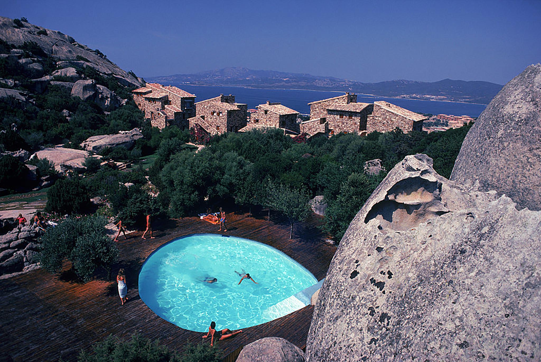 Slim Aarons Landscape Photograph - Pool At Porto Rotondo, Estate Edition (Sardinia, Italy)