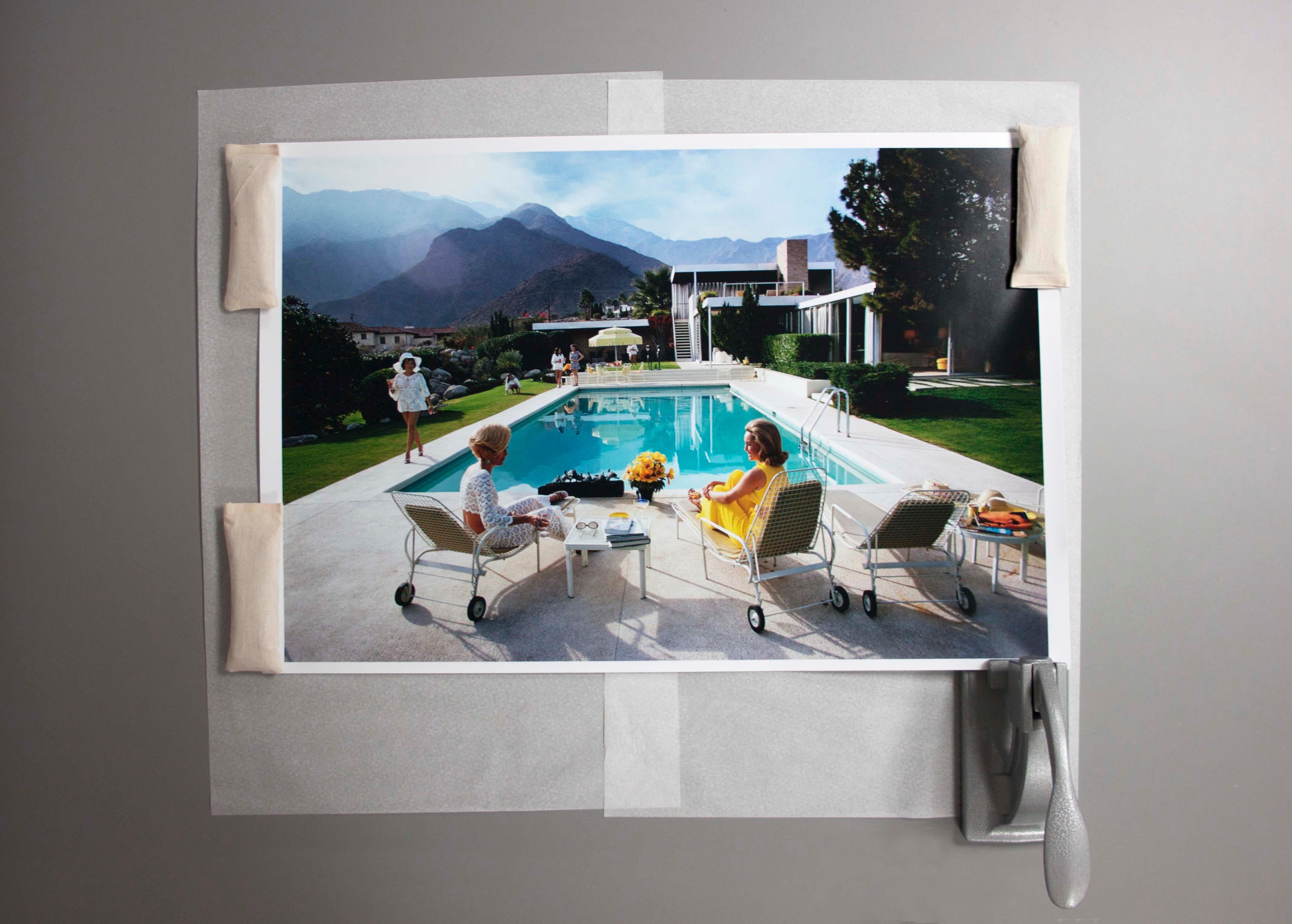 A desert house in Palm Springs designed by Richard Neutra for Edgar J. Kaufmann. Lita Baron (far left) approaches Helen Dzo Dzo (left) and Nelda Linsk, wife of art dealer Joseph Linsk. Original Artwork: A Wonderful Time - Slim Aarons

The most