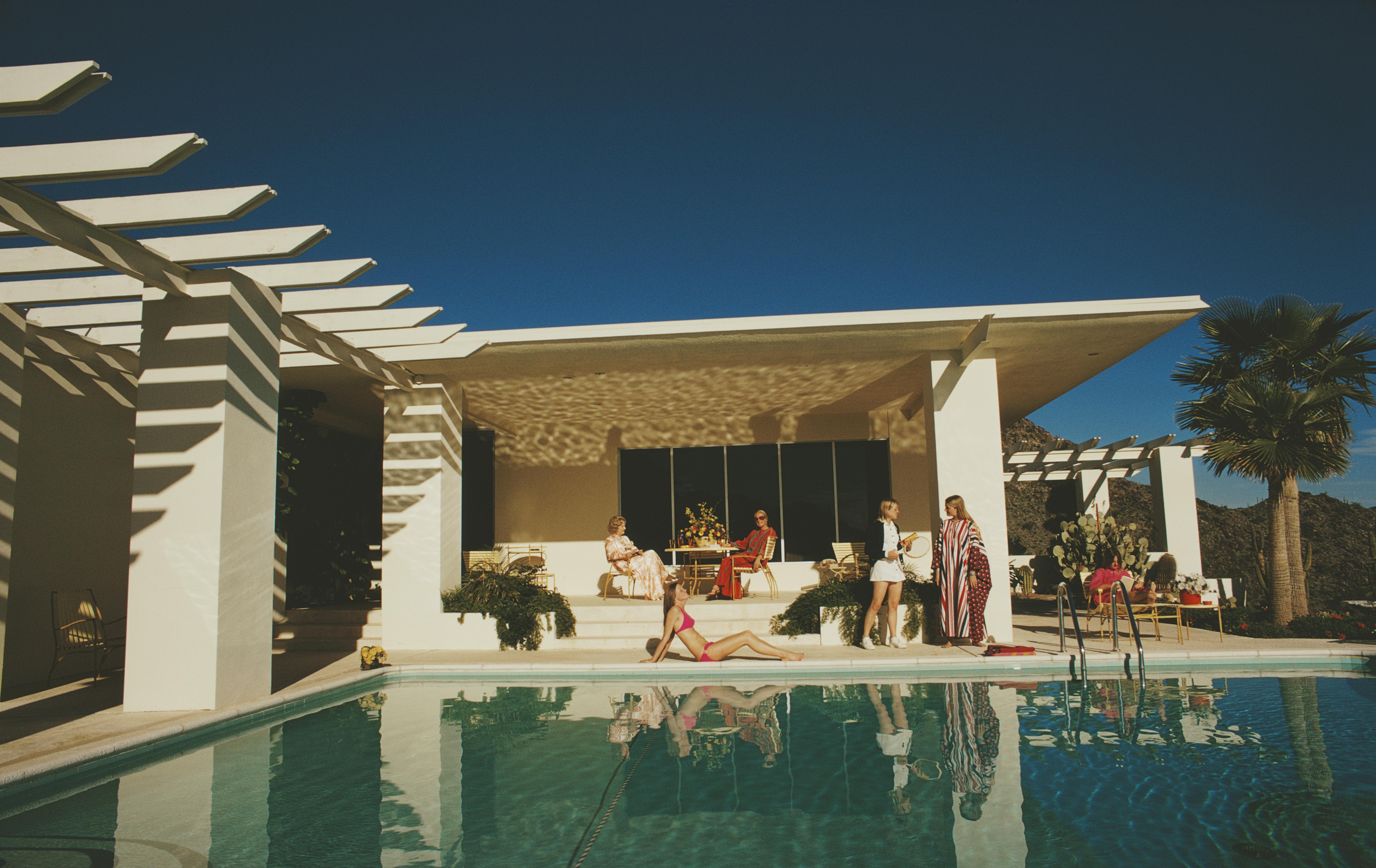 'Poolside In Arizona' 1973 Slim Aarons Limited Estate Edition Print 

Guests by the pool at the home of Wayne Beal in Scottsdale, Arizona, January 1973. 

Produced from the original transparency
Certificate of authenticity supplied 
Archive