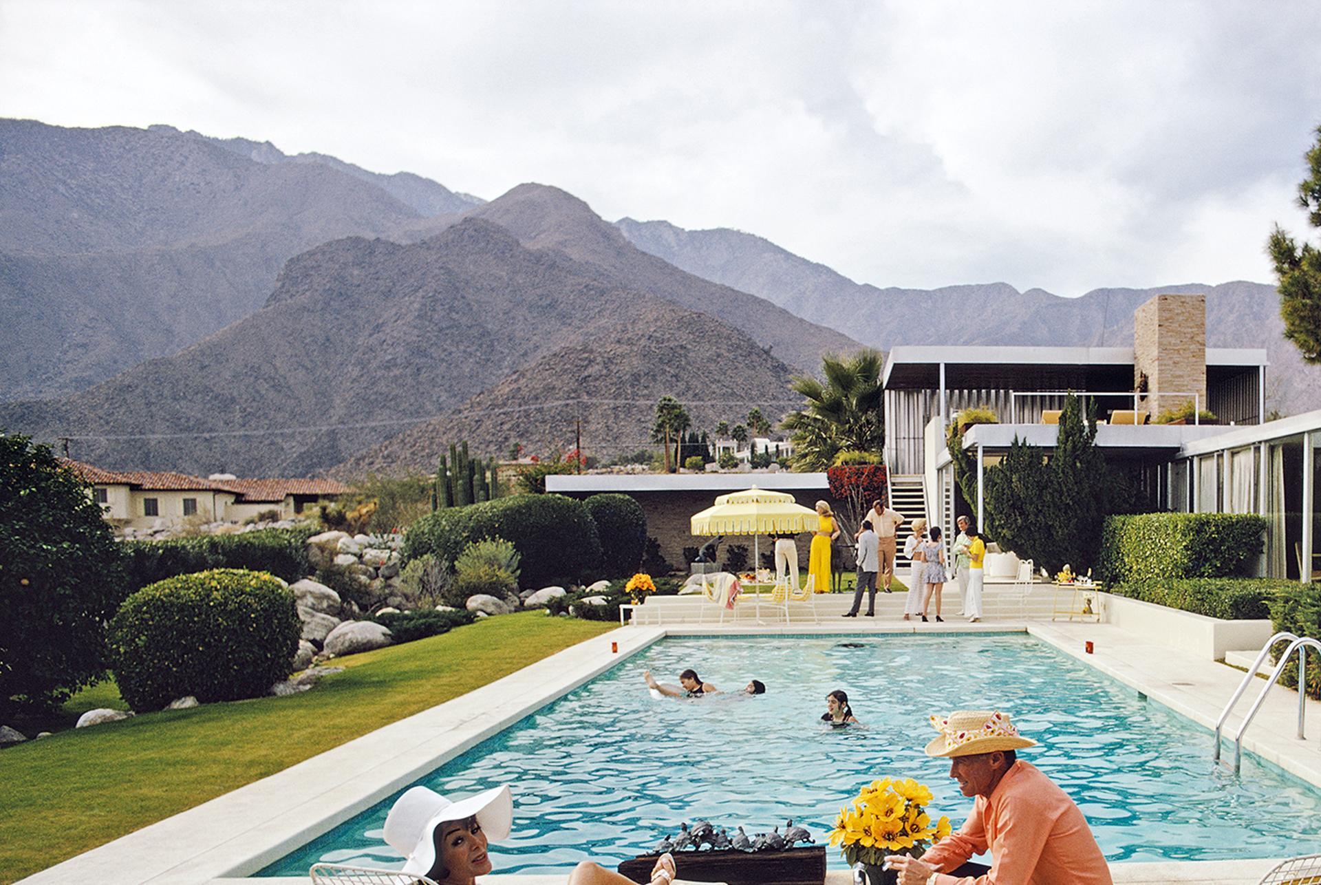 Poolside Interruption, Palm Springs Poolside Series, Estate Edition - Photograph by Slim Aarons