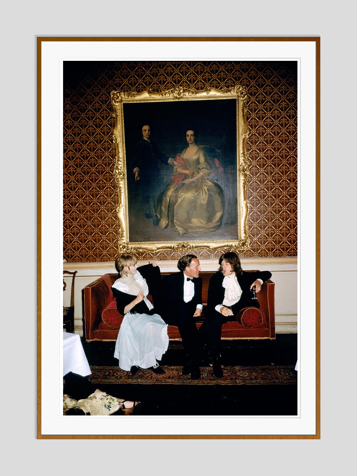 Pop And Society 

1968

1968: From left to right; singer Marianne Faithfull, the Honorable Desmond Guinness and Mick Jagger (of the Rolling Stones) sit on a sofa under a large gilt framed painting of a woman in 18th century dress at Leixlip Castle,