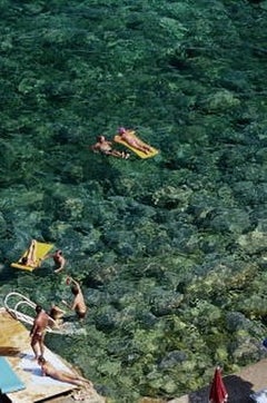 Spiaggia di Porto Ercole - Ombrelloni e acqua Costa Toscana nel Sud Italia