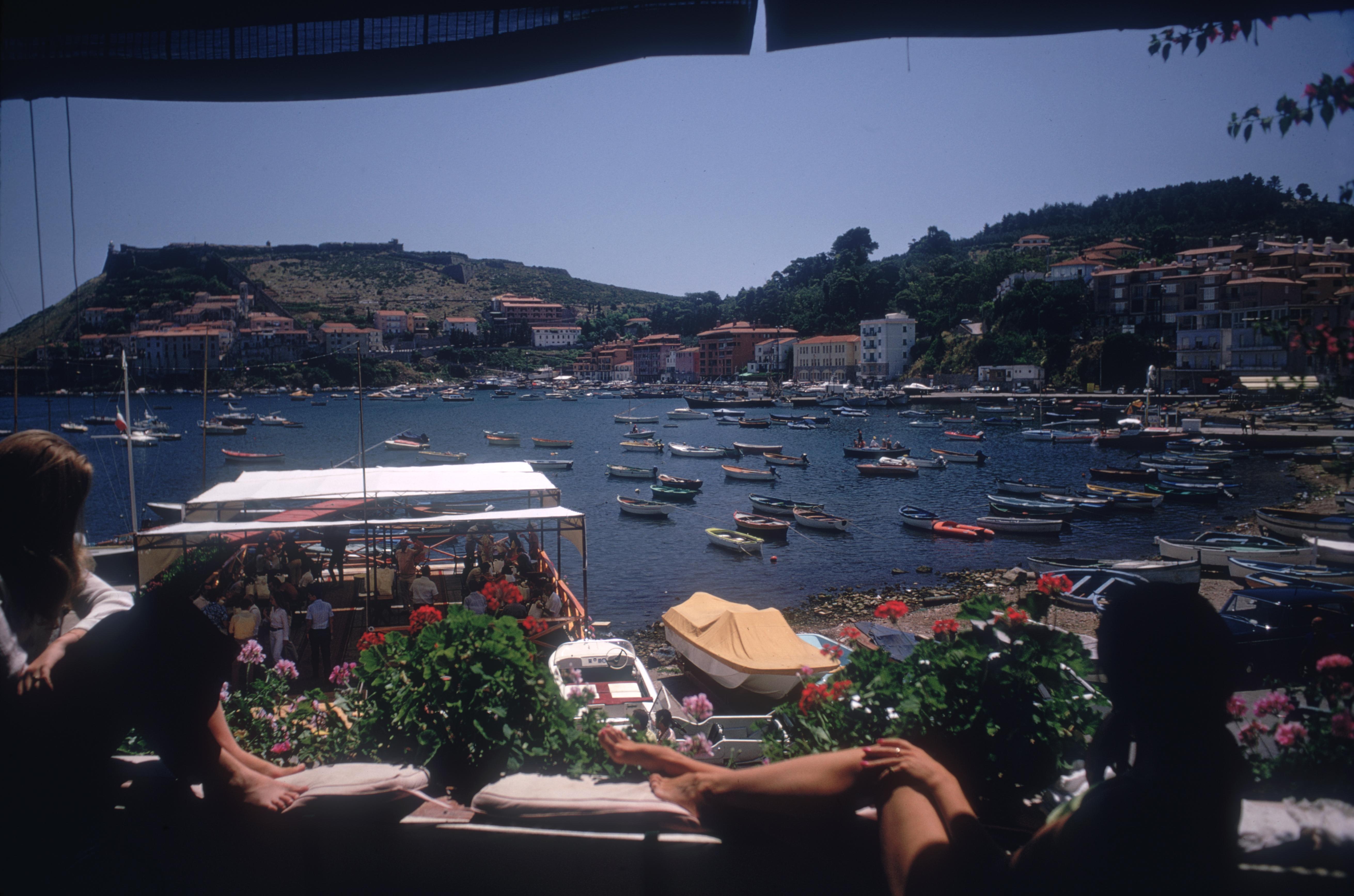 Slim Aarons Color Photograph - Porto Ercole, Estate Edition