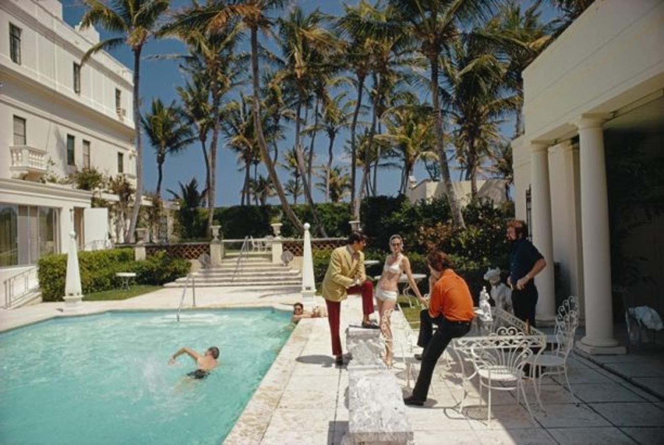 Posing By The Pool 
1968
by Slim Aarons

Slim Aarons Limited Estate Edition

A swimming pool in Palm Beach, Florida, 1968

unframed
c type print
printed 2023
16×20 inches - paper size


Limited to 150 prints only – regardless of paper size

blind