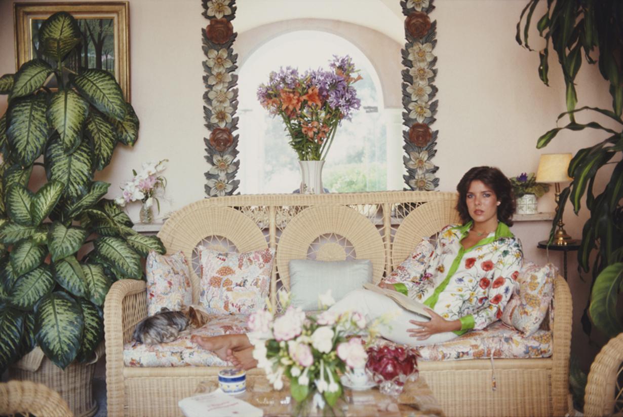 Princess Caroline Of Monaco 
1981
by Slim Aarons

Slim Aarons Limited Estate Edition

Princess Caroline of Monaco in the winter-garden room of her house on the palace grounds, Monte Carlo, Monaco, August 1981

unframed
c type print
printed
