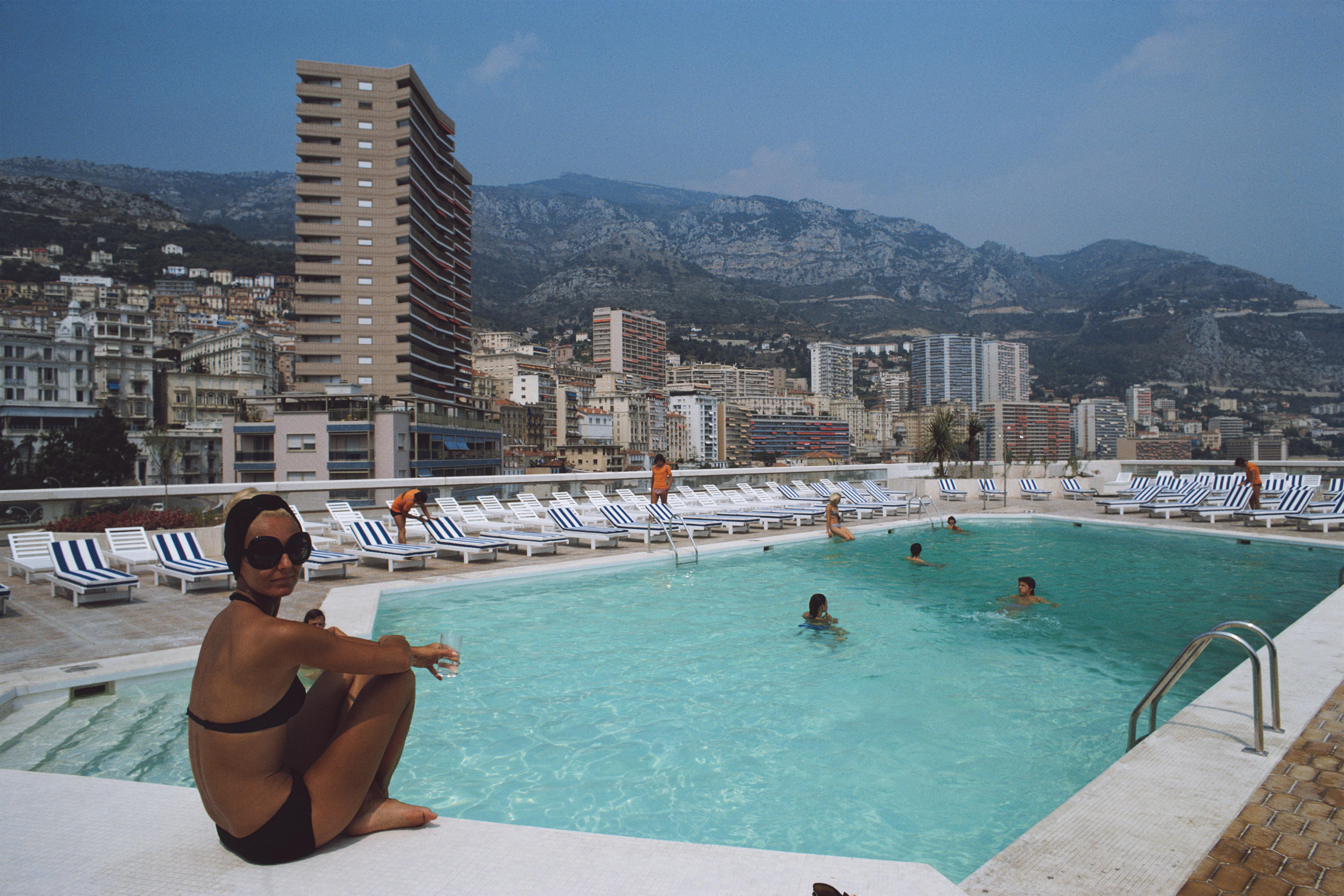 'Rooftop Pool' 1975 Slim Aarons Limited Estate Edition Print 

A woman by the pool on the roof of the Loews Hotel, Monte Carlo, Monaco, August 1975.

Produced from the original transparency
Certificate of authenticity supplied 
Archive