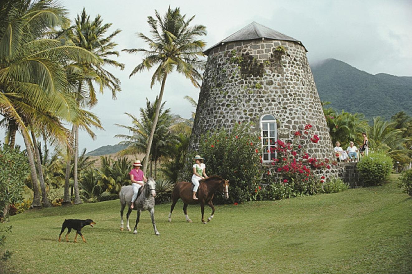 'Saint Kitts and Nevis' 1984 Slim Aarons Limited Estate Edition Print 

Horseback riding at the Rawlins Plantation inn, Saint Kitts and Nevis, West Indies, March 1984.

Produced from the original transparency
Certificate of authenticity supplied