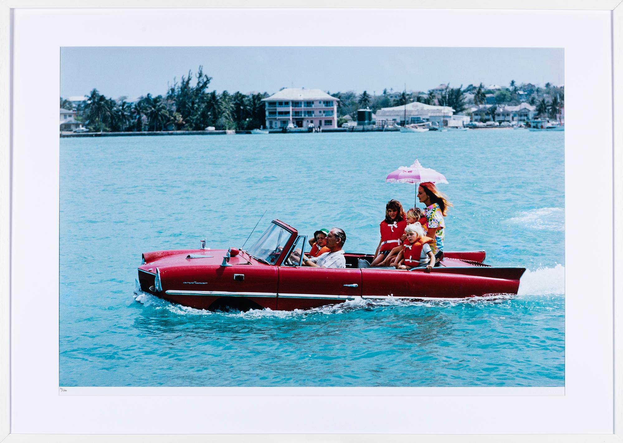 Slim Aarons, Sea Drive. A drive in an Amphicar across the harbour at Nassau 1967 For Sale 1