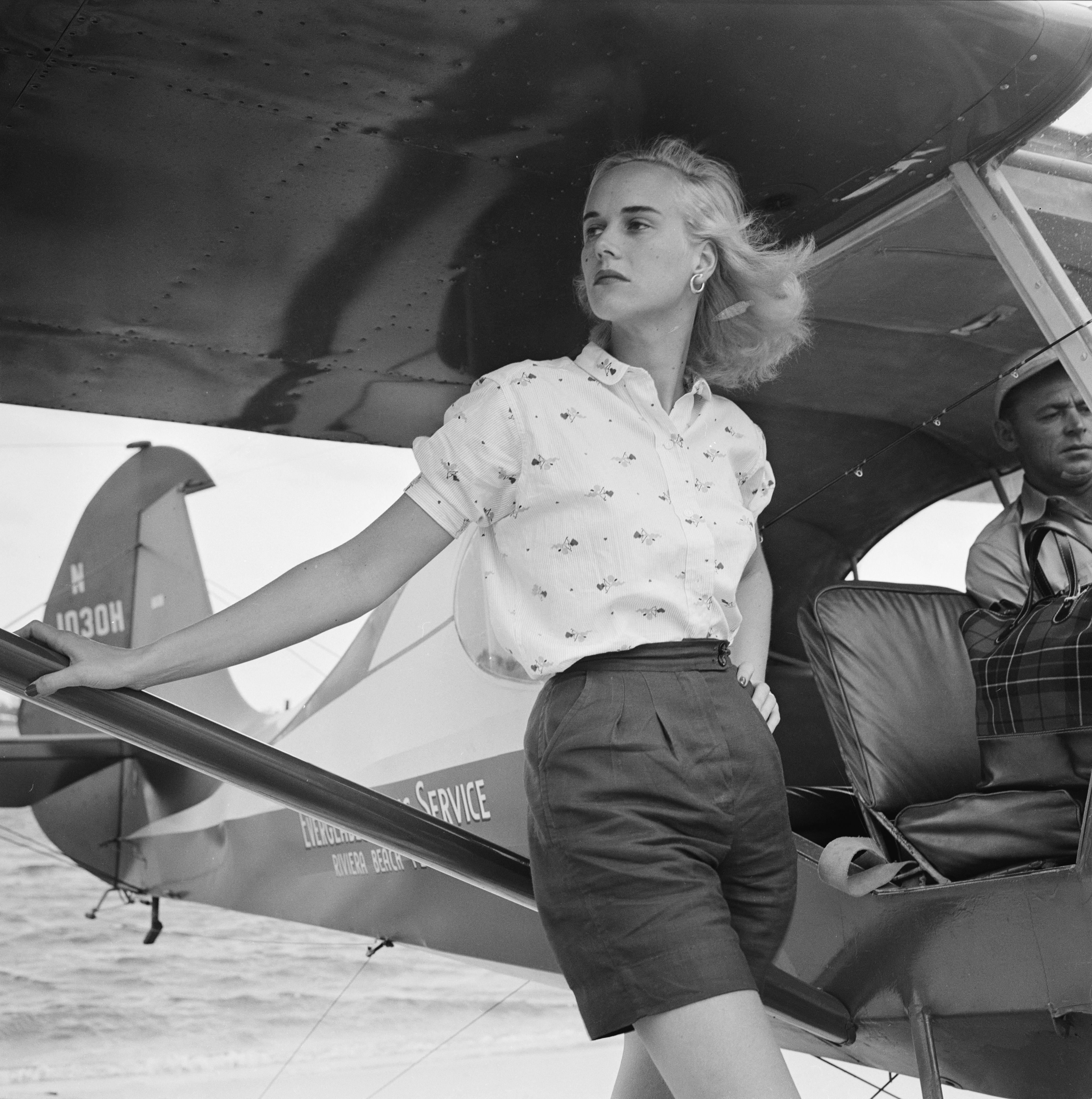 'Seaplane At Palm Beach' 1955 Slim Aarons Limited Estate Edition

Patsy Pulitzer (nee Patsy Bartlett) leaning against a seaplane belonging to the Everglades Flying Service, at Palm Beach, Florida, circa 1955.

Silver Gelatin Fibre Print
Produced