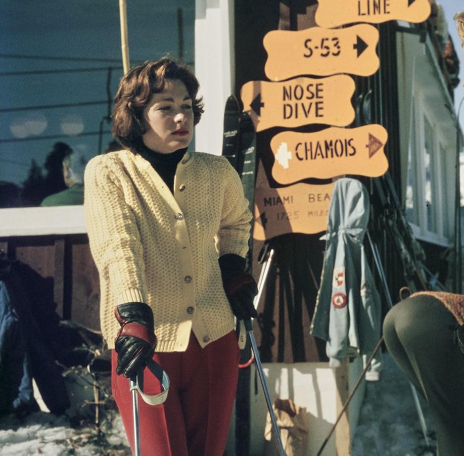 Skiing in Stowe, 1962 - American Winter Ski Fashion Vermont Spruce Peak - Gray Portrait Photograph by Slim Aarons