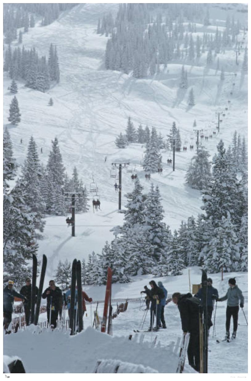 Skiing in Vail 1964 - Slim Aarons 

A group of skiers stand in line waiting for the ski lift in Vail, Colorado, USA, 1964. 

40 x 30" inches / 101 x 76 cm paper size 

Photo by Slim Aarons

Printed This Year

Certificate of authenticity