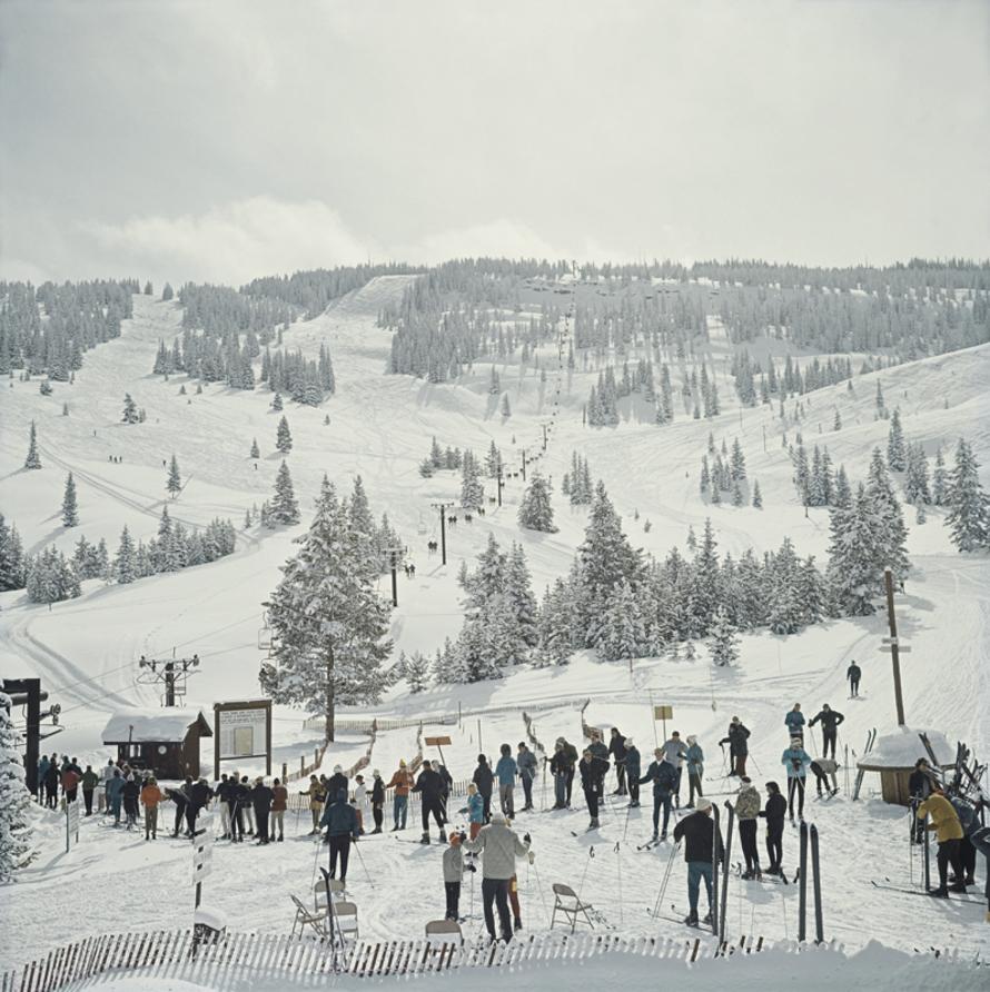 Skiing in Vail 
1964
by Slim Aarons

Slim Aarons Limited Estate Edition

A group of skiers stand in line waiting for the ski lift in Vail, Colorado, USA, 1964

unframed
c type print
printed 2023
20 x 20"  - paper size


Limited to 150 prints only –
