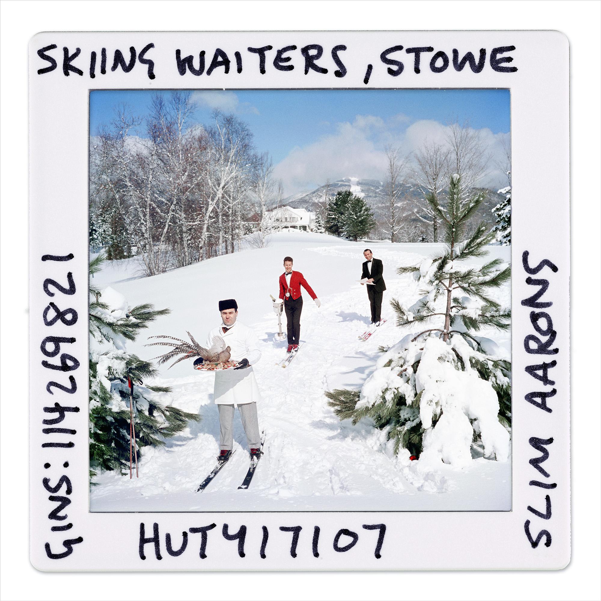 Skiing Waiters, Estate Edition, midcentury glamour in Stowe, Vermont - Gray Landscape Photograph by Slim Aarons