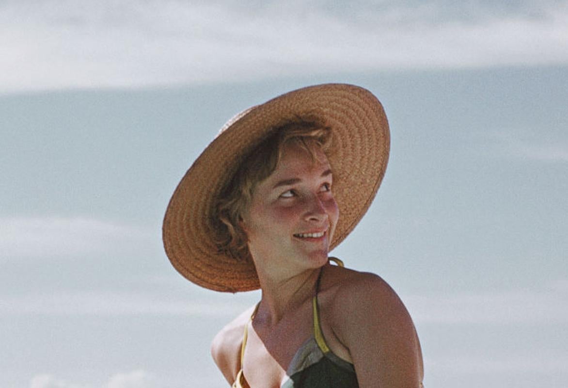 Acapulco, Estate Edition, Ingrid Morath poolside in the 1960s - Photograph by Slim Aarons